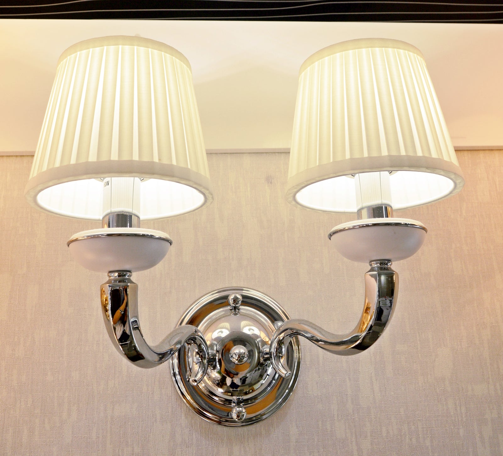 Elegant Dual-Arm Chrome Wall Light with Fabric Shades