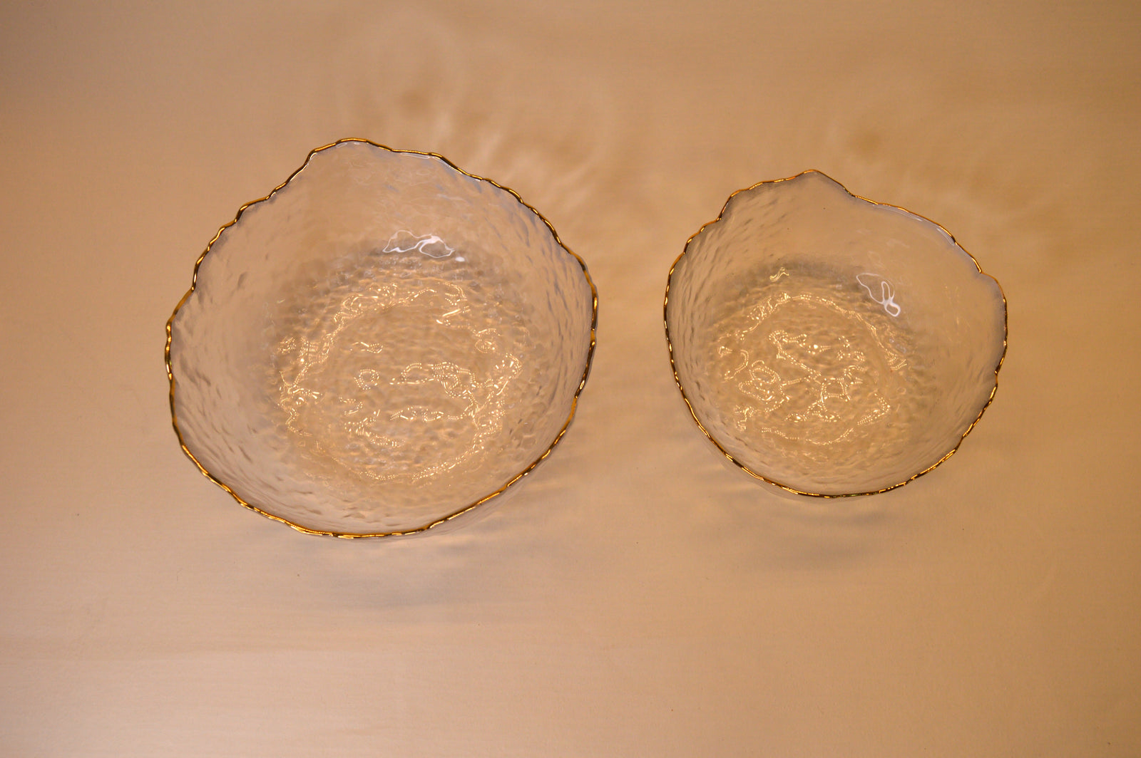Wavy Bowls with gold edge in two different sizes with matching set of 6pcs glasses