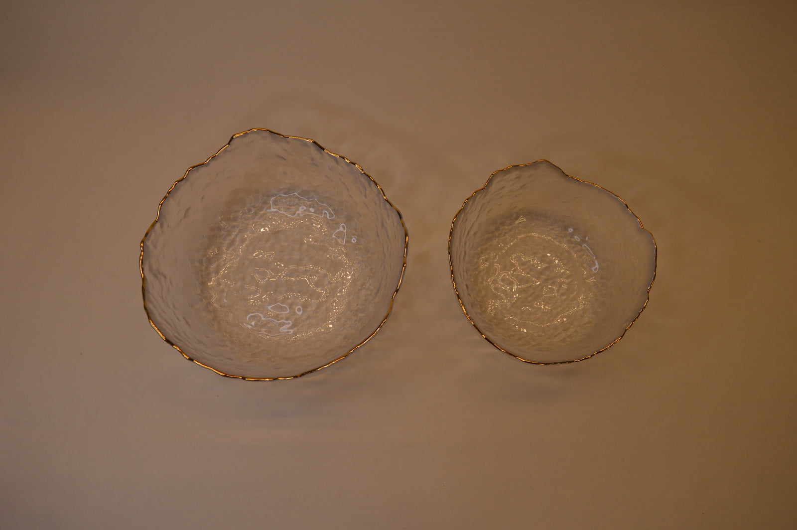 Wavy Bowls with gold edge in two different sizes with matching set of 6pcs glasses
