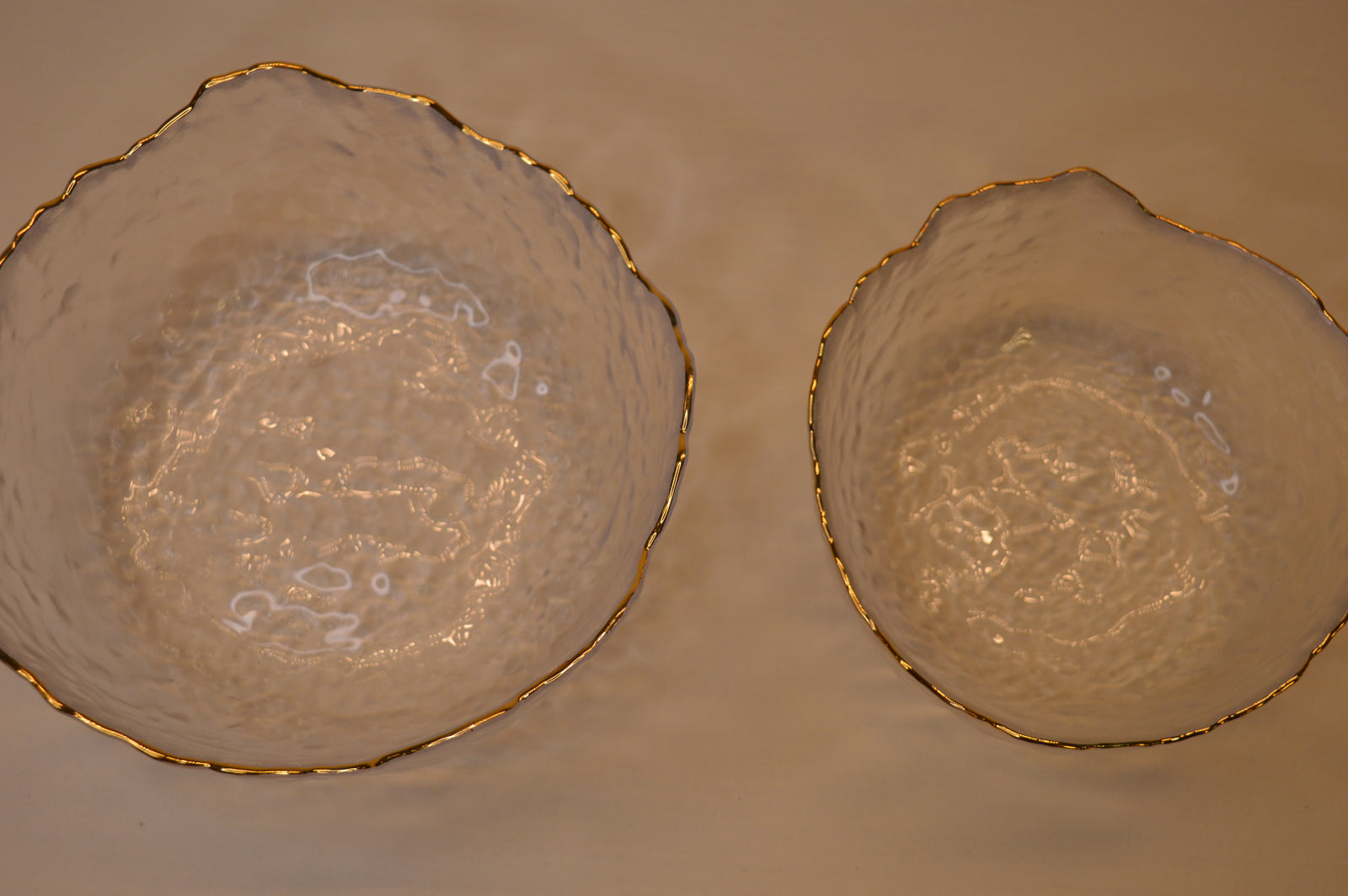 Wavy Bowls with gold edge in two different sizes with matching set of 6pcs glasses