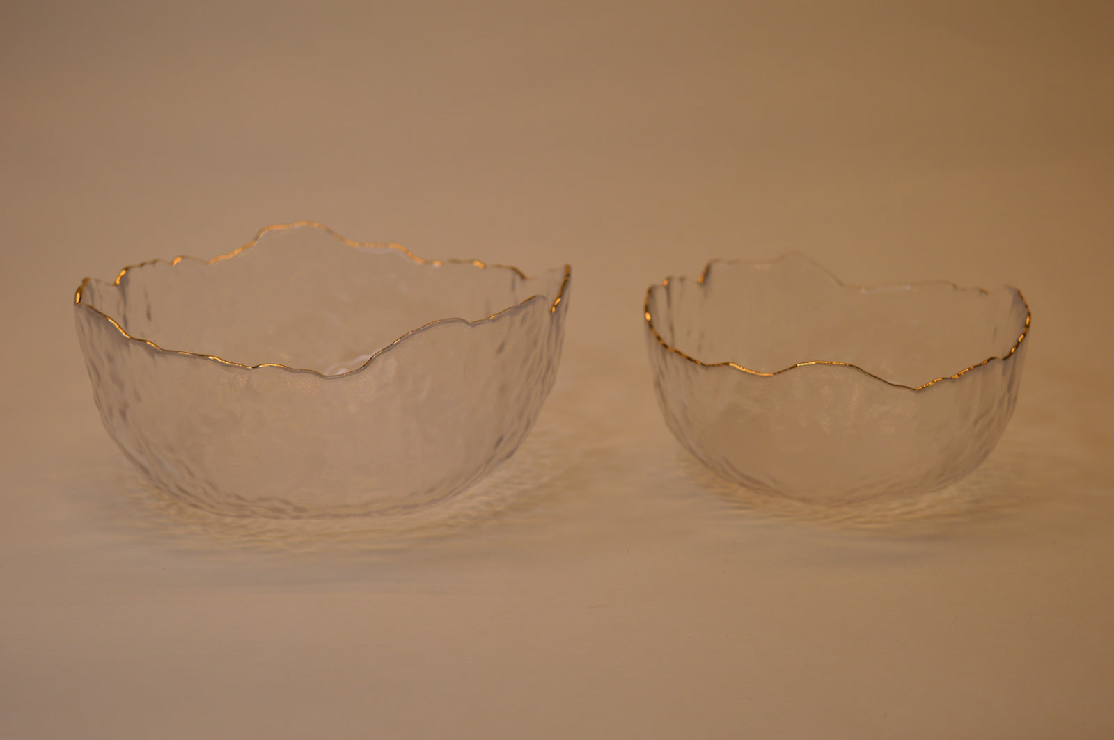 Wavy Bowls with gold edge in two different sizes with matching set of 6pcs glasses