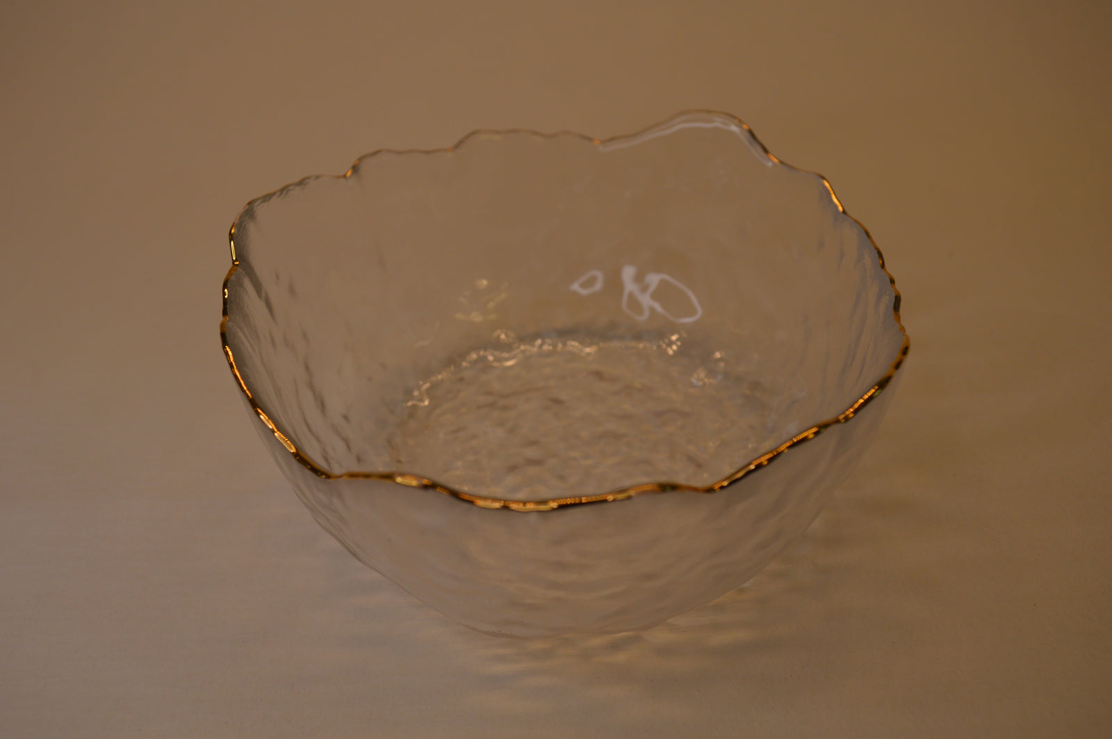 Wavy Bowls with gold edge in two different sizes with matching set of 6pcs glasses