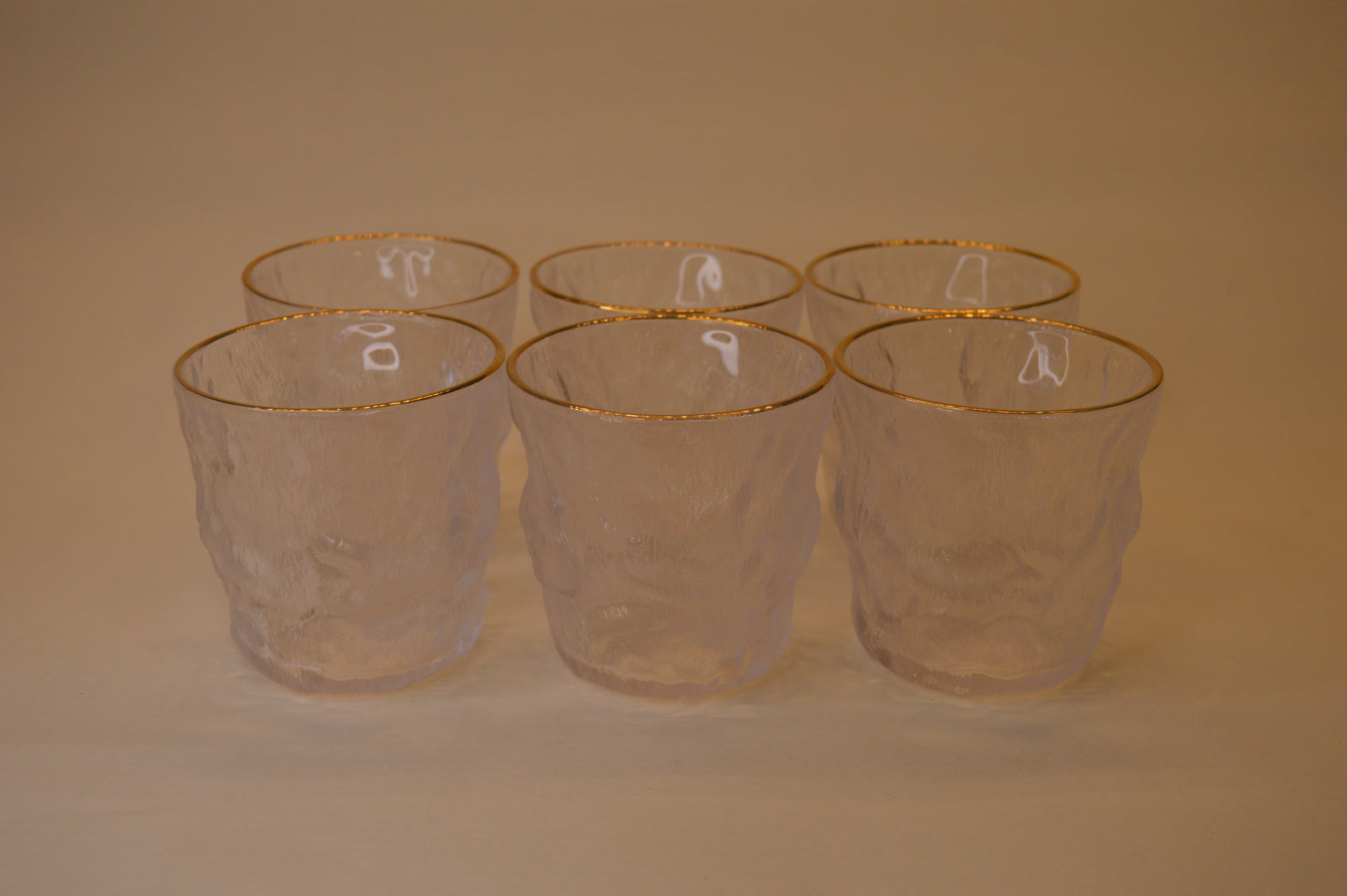 Wavy Bowls with gold edge in two different sizes with matching set of 6pcs glasses